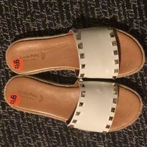 Woman’s white sandals